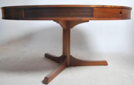 A mid century retro Robert Heritage for Archie Shine large drum shaped dining table. The round top