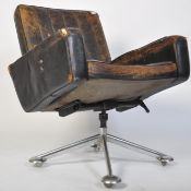 A 1970's chrome and leather swivel - deck chair having stunning full grain patchwork leather seat