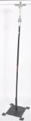 A mid 20th century aluminium ecclesiastical processional church cross depicting Jesus on the