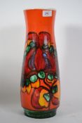 A large Poole Pottery Aegean / Delphis pattern tall base with red ground and floral design by drip