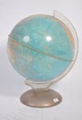 A large mid century table top globe by Purnell & Sons Ltd London ' The Illumina Globe ' Raised on