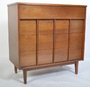 A superb mid century teak chest of drawers by Gibbard. The chest with vertical pull handles to the