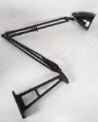 A large early 20th century Industrial wall mounted anglepoise desk / factory lamp having two tone