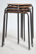 A set of four vintage retro 20th century dot stools in the manner of Arne Jacobsen for Fritz Hansen.