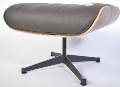 After Charles & Ray Eames. A Herman Miller  671 Ottoman raised on polished quadruped swivel base