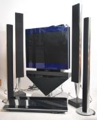 An exceptional Bang & Olufsun entertainment system comprising beocentre hi-fi with television on B&O