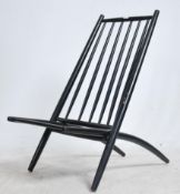 An original 1950's ' Congo ' chair by Alf Svenssen for Haga Fors of Sweden. The chair made of