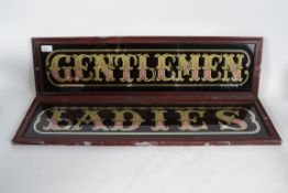 A pair of fabulous mid century mirror glass framed signs ' Ladies & Gentleman ' Each sign in