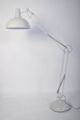 A large Industrial style floor standing anglepoise standard lamp in the manner of Herbert Terry.