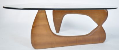 A good contemporary Isamu Noguchi coffee table - occasional table having glass top raised over a