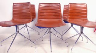 A set of 6 good brown leather and chrome swivel dining chairs. Raised on quadruped raised feet