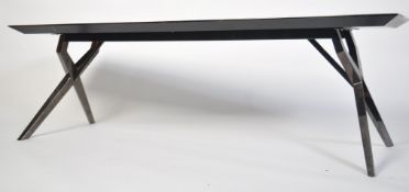 A 20th century modernist 'longjohn ' coffee - occasional table with polished mirror'd metal