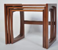 A G-Plan retro teak wood 1970's graduating nest of tables in the Quadrille pattern. The tables