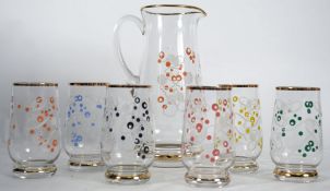 A hand painted vintage 1950's glass lemonade Pimms set comprising a gilt trimmed jug and six