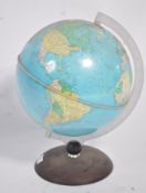 A 20th century table top globe by Nova Editions Rico Florence. Raised on faux rosewood with clear