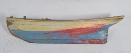 A stunning early 20th century handmade wooden pond yacht boat hull of well shaped form having
