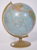A 20th century Danish Phillips terrestrial polyglobe / desk top globe being raised on a circular