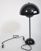 A contemporary flowerpot desk lamp in black by Louis Poulsen for Verner Panton. Domed half spheres