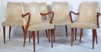 A set of 8 1950's mid century retro dining chairs by Ronald E Long for RS Stevens Ltd. Raised on