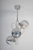 A 1970's 20th century retro eyeball ceiling light - spot light in white having ball spots on