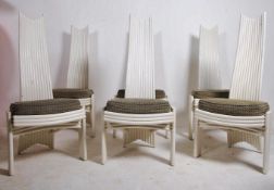A set of 6 1980's designer wooden bentwood dining chairs constructed of individual wooden poles