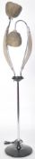 A stunning retro 20th century twin headed standard lamp. Fitted with two fiberglass sugar spun