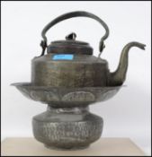 A 19th / 20th century middle eastern hand beaten k