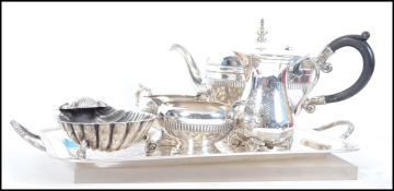 A set of silver plated items to include salver tra