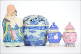 A good group of oriental ceramics to include a pai