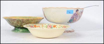 A collection of ceramics to include a Clarice clif