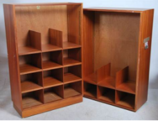 A large twin modular teak wood bookcase by Simplex. The double section body with adjustable shelving