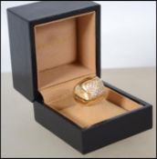 An 18ct gold and diamond pyramid ring by Bvalgari