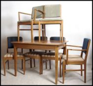 n original Gordon Russell walnut extending dining