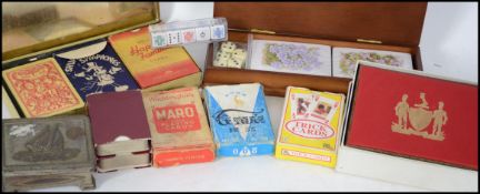 A collection of playing cards to include Happy Fam