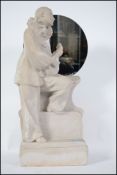 A large 20th century plaster figurine of a Pierrot