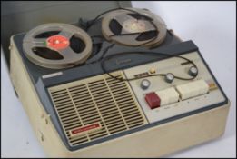 A vintage mid 20th century cased portable Reel to