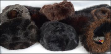 A group of fur and faux fur clothing items to incl