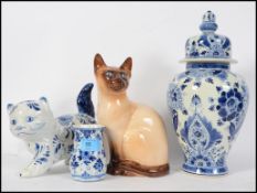 A small collection of ceramics to include three pi