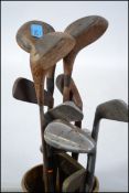A good collection of vintage golf clubs to include