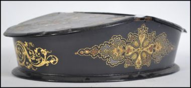A 19th century oval papier mache work / sewing box