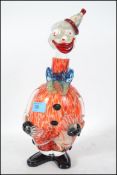 An unusual mid century Murano glass clown bottle d