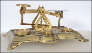 A good Victorian Art Nouveau brass postal scales s