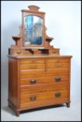An Edwardian satin walnut dressing chest of drawer