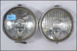 A pair of vintage Lucas classic car motoring M5 he