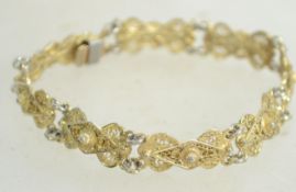 A continental gilt silver fret pierced bracelet ha