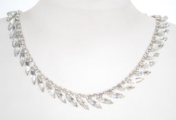 A 1950s white rhinestone necklace in a silver tone