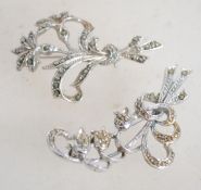Two vintage 1950s marcasite floral brooches in a s
