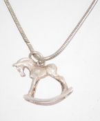 A sterling silver snake link necklace chain with a