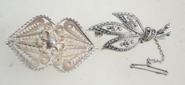 Two silver filigree fret pierced brooches one bein