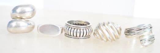 A group of heavy sterling silver dress rings two b
